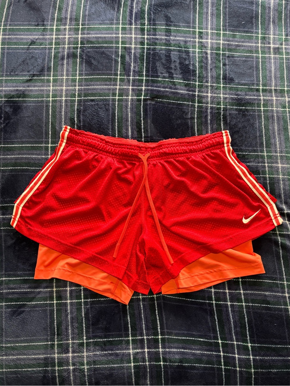 Nike red running shorts w/attached orange Nike pros.Size L.